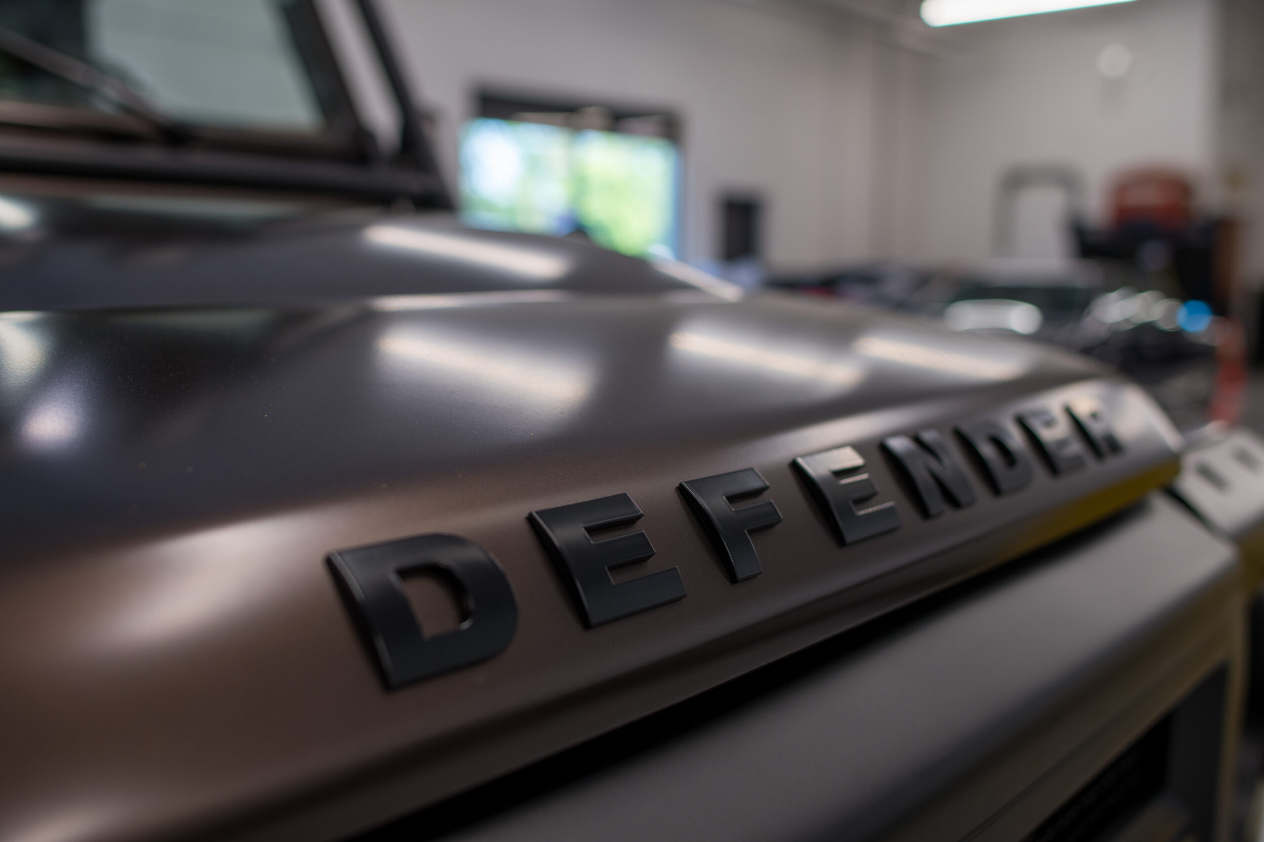 LR000 “Land Rover Defender in repair bay”