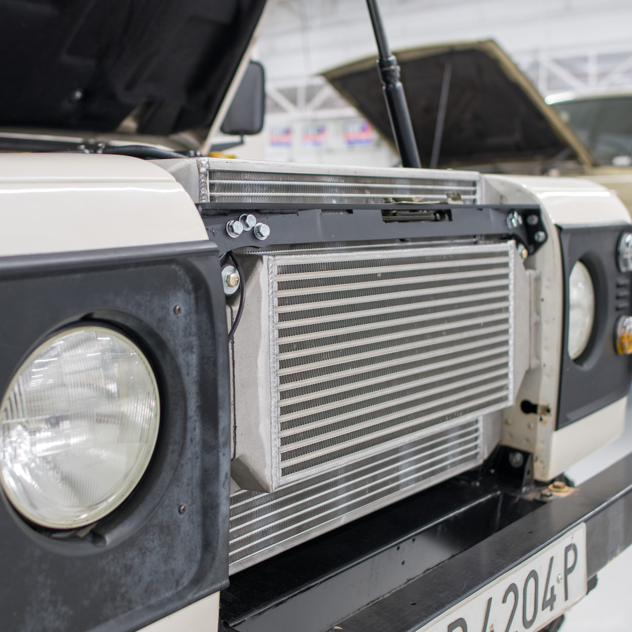 LR003 “Close-up of Range Rover engine work”