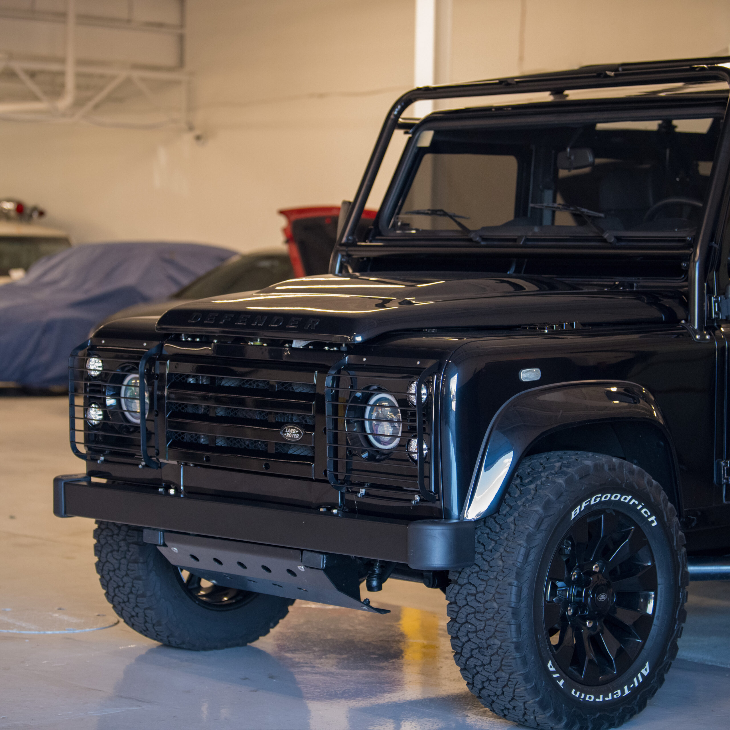 LR004 “Mechanic inspecting Land Rover drivetrain”