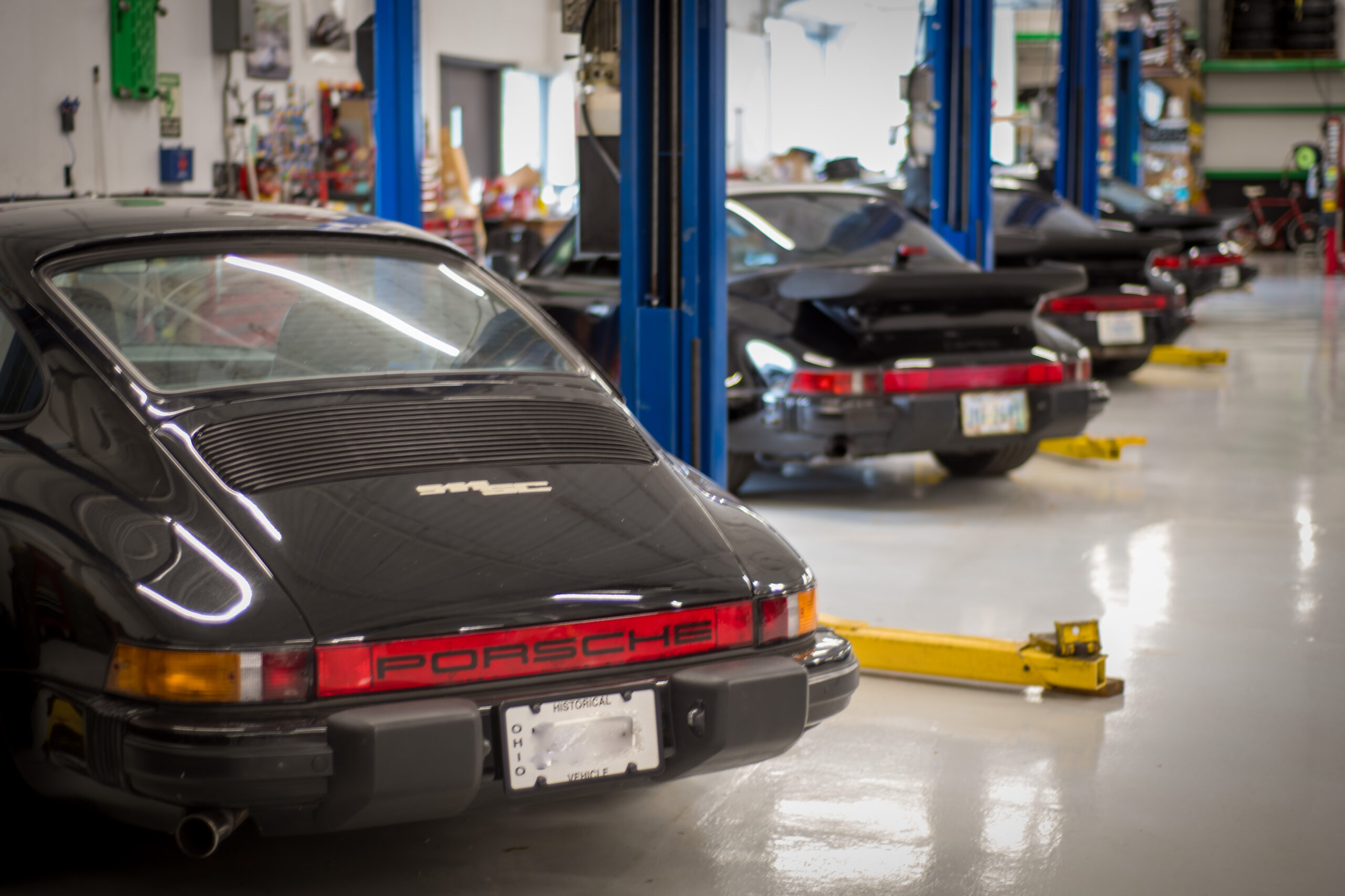 PC006 “Porsche 911 in service bay at Zakira’s”